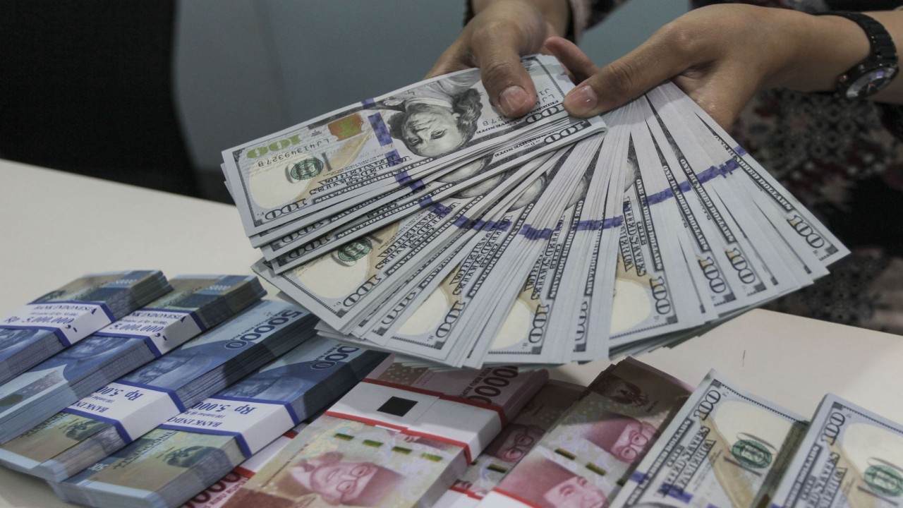 Ilustrasi mata uang rupiah dan dolar AS/ist