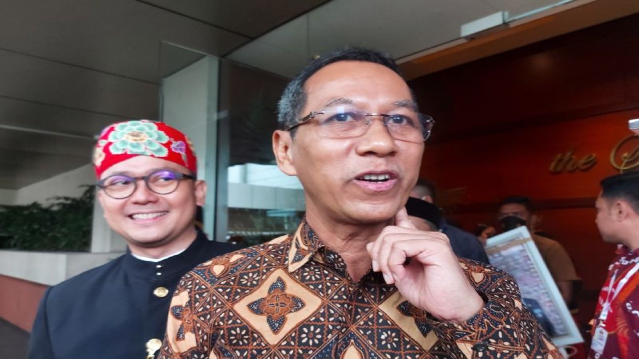Penjabat Gubernur DKI Jakarta Heru Budi Hartono usai membuka Konvensi Humas Indonesia Tahun 2022 di Jakarta, Rabu (14/12/2022). ANTARA/MENTARI DWI GAYATI