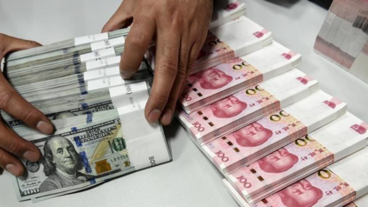 Ilustrasi: Dolar Amerika dan Yuan China (ANTARA/REUTERS)