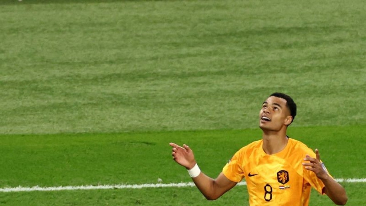 Pesepak bola Belanda Cody Gakpo merayakan golnya ke gawang Ekuador saat laga Grup A Piala Dunia 2022 di Khalifa International Stadium, Doha, Qatar, Jumat (25/11/2022). ANTARA FOTO/REUTERS/Marko Djurica/foc.