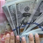 Mata uang rupiah dan dolar AS/ist-1671530251