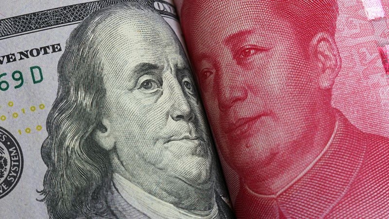 Mata uang dolar AS dan yuan China. ANTARA/Shutterstock/rustamxakim/aa.