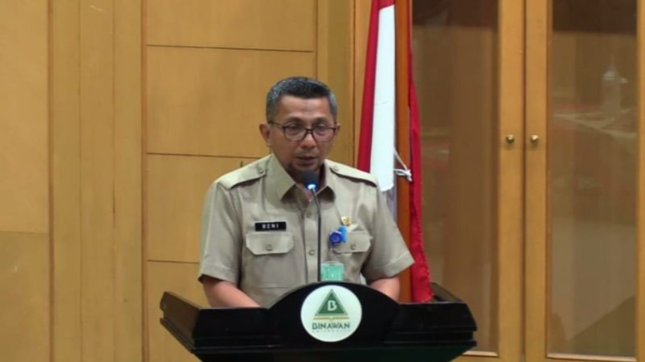 Tangkapan layar Ketua Sub Kelompok Kesehatan, Pemberdayaan, Perlindungan Anak dan Pengendalian Penduduk Bagian Kesejahteraan Rakyat Kota Administrasi Jakarta Timur Beni Hari Wibowo saat membuka Peringatan Hari Gizi Nasional ke-63 di Universitas Binawan, Kelurahan Cawang, Kecamatan Kramat Jati, Jakarta Timur, Selasa (7/2/2023), yang ditayangkan secara daring. ANTARA/Syaiful Hakim