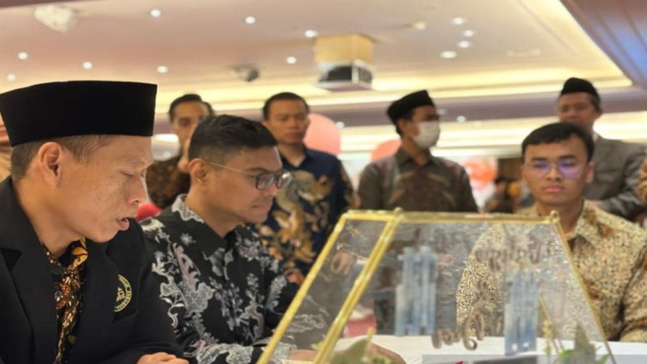Suasana nikah massal untuk 31 pasangan WNI di Taiwan yang digelar KDEI Taipei pada Minggu (19/3/2021). (ANTARA/HO-KDEI Taipei)