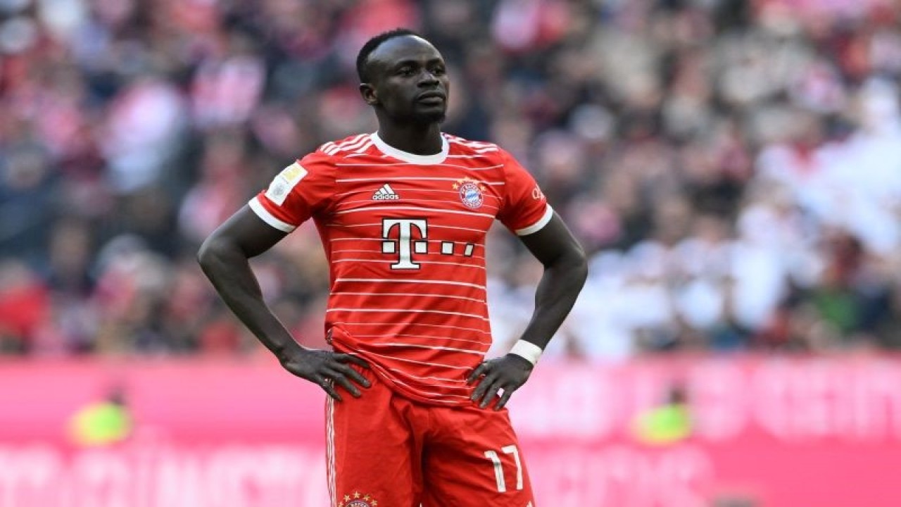 (FILES) In this file photo taken on March 11, 2023 Bayern Munich's Senegalese striker Sadio Mane reacts during the German first division Bundesliga football match between FC Bayern Munich v FC Augsburg 1907 in Munich, southern Germany, on March 11, 2023. - Bayern Munich have suspended forward Sadio Mane for one game following an altercation with Leroy Sane after this week's Champions League loss to Man City, the club announced on April 13, 2023. (Photo by Christof STACHE / AFP) / DFL REGULATIONS PROHIBIT ANY USE OF PHOTOGRAPHS AS IMAGE SEQUENCES AND/OR QUASI-VIDEO (AFP/CHRISTOF STACHE)