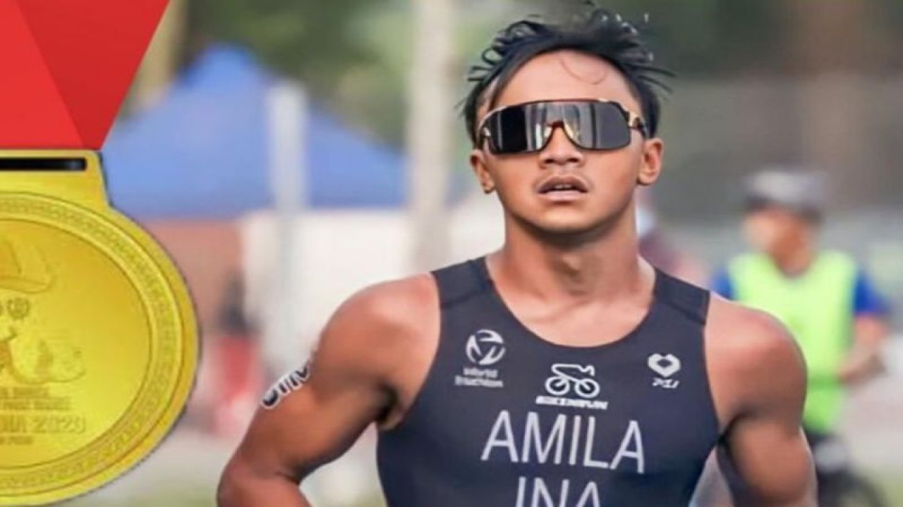 Rashif Amila Yaqin menyumbang medali emas pertama untuk Kontingen Indonesia di SEA Games XXXII/2023 Kamboja setelah finis terdepan dalam perlombaan aquatlon perseorangan putra di Kep Town Beach, Kep, Kamboja, Sabtu (6/5/2023). HO-Tim Media SEA Games 2023