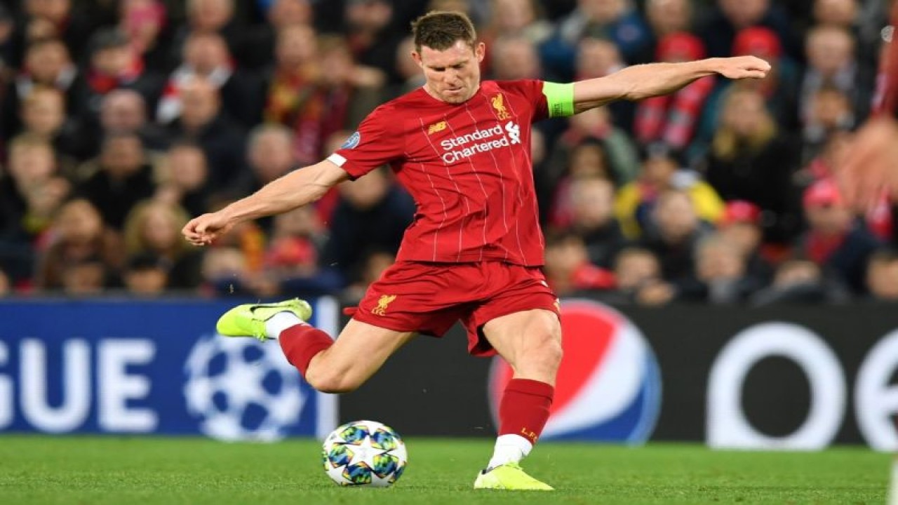 Liverpool's English midfielder James Milner has an unsuccessful shot during the UEFA Champions league Group E football match between Liverpool and Salzburg at Anfield in Liverpool, north west England on October 2, 2019. (Photo by Paul ELLIS / AFP) (AFP/PAUL ELLIS)