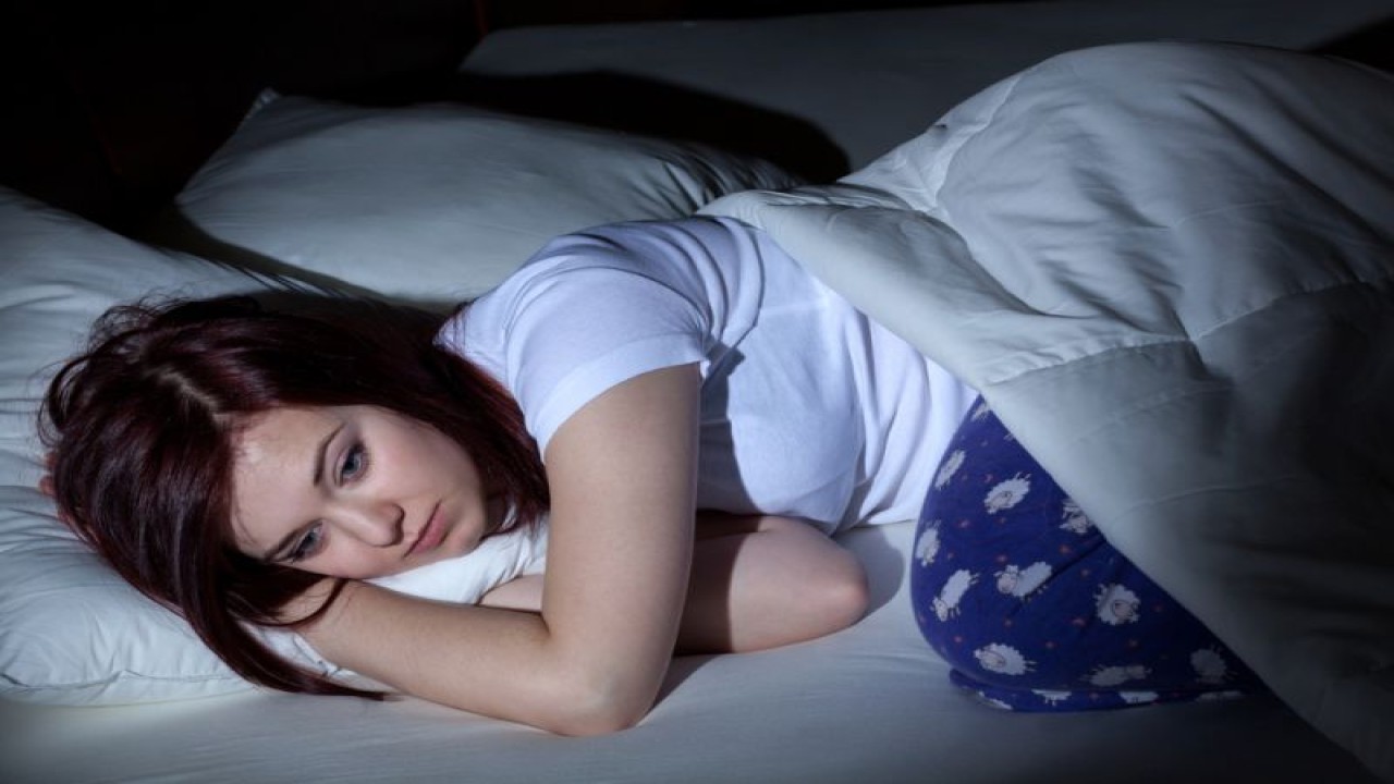 Ilustrasi seorang perempuan yang tidak bisa tidur (ANTARA/Shutterstock)