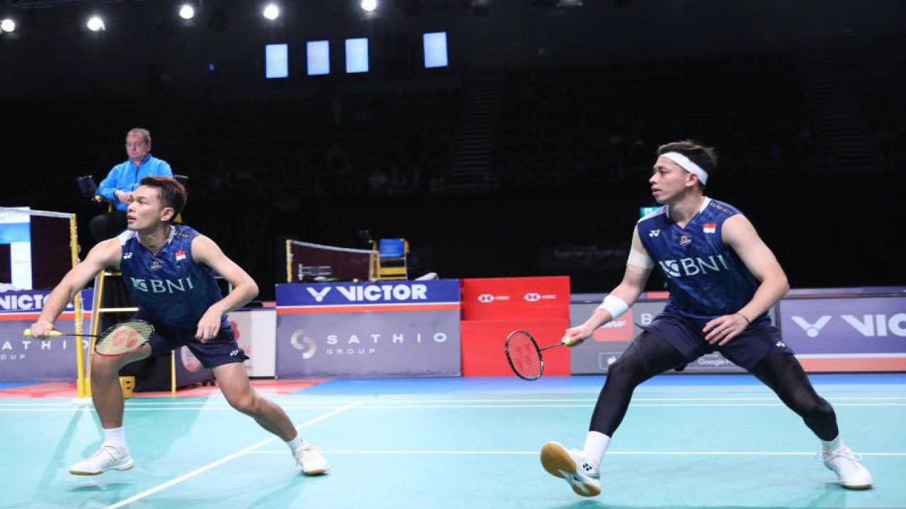 Pasangan ganda putra Indonesia Fajar Alfian/Muhammad Rian Ardianto saat berlaga di perempat final Australian Open 2023, Jumat (4/8/2023). (ANTARA/HO/PBSI)