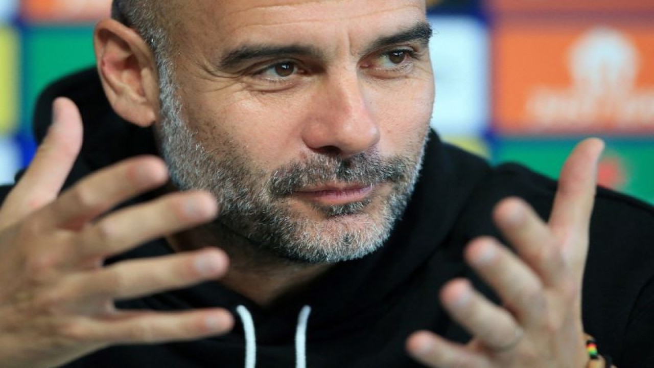 Pelatih Manchester City Pep Guardiola. (ANTARA/AFP/LINDSEY PARNABY)