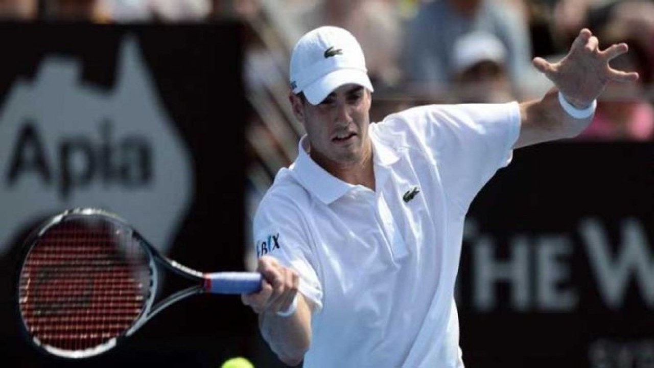 Petenis Amerika Serikat, John Isner. (AFP/MANAN VATSYAYANA) (AFP/MANAN VATSYAYANA/)