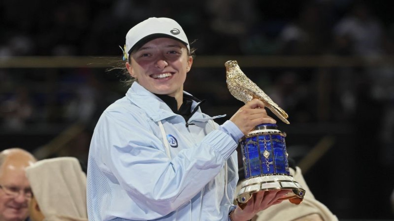 Petenis Polandia Iga Swiatek (AFP/KARIM JAAFAR)