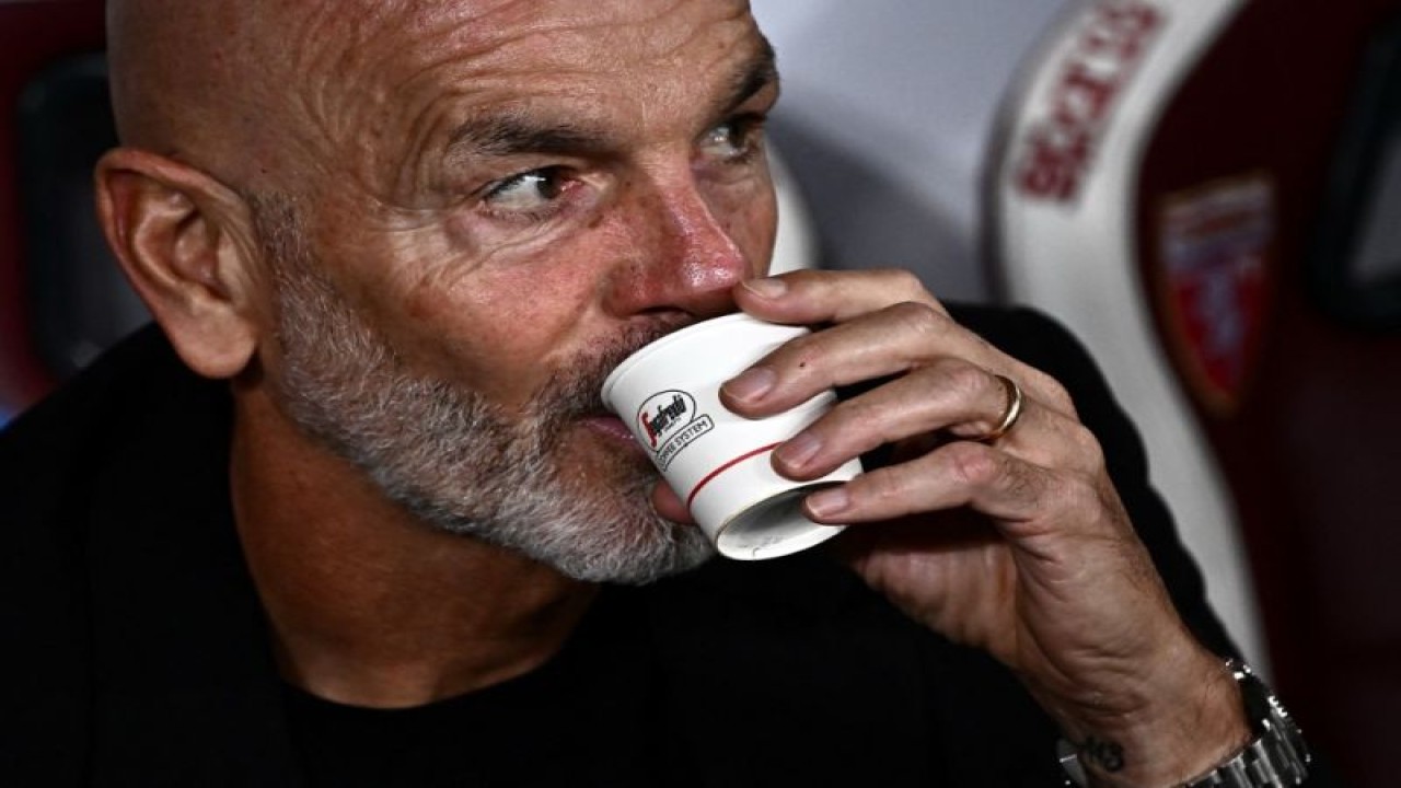 Pelatih AC Milan Stefano Pioli (Photo by MARCO BERTORELLO / AFP) (AFP/MARCO BERTORELLO)