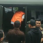 Terpidana Santo masuk ke mobil Kejati Sumut di Medan, Sumatera Utara, Rabu (6/9/2023). (ANTARA/HO - Kejati Sumut)-1693984310
