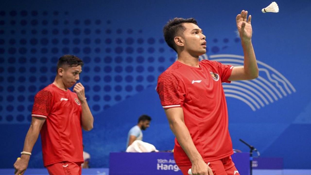 Pebulu tangkis ganda putra Indonesia Muhammad Rian Ardianto (kanan) dan Fajar Alfian. ANTARA FOTO/M Risyal Hidayat/aww. (ANTARA FOTO/M RISYAL HIDAYAT)