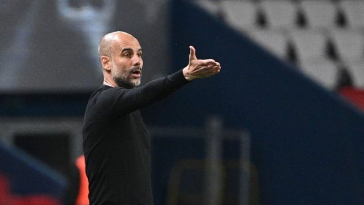 Arsip foto - Pelatih Manchester City asal Spanyol Pep Guardiola. ANTARA/AFP/ANNE-CHRISTINE POUJOULAT/pri. (ANTARA/AFP/ANNE-CHRISTINE POUJOULAT)