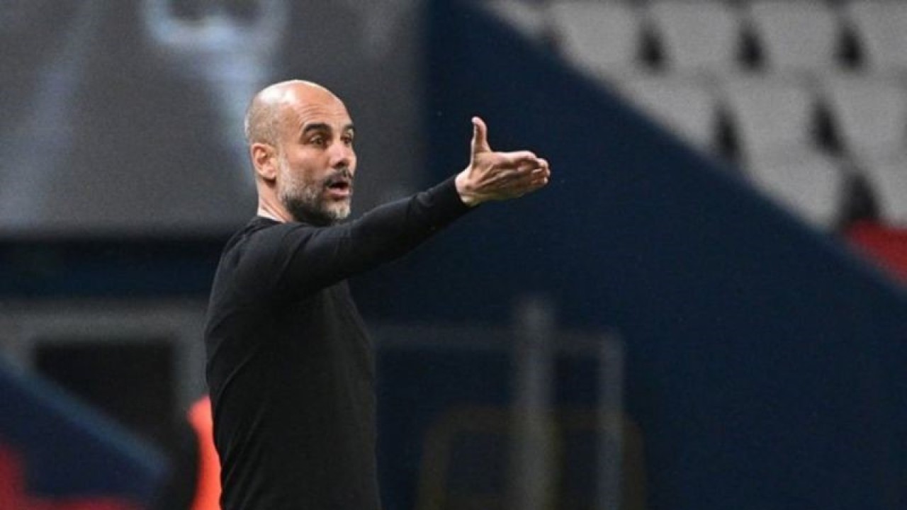 Arsip foto - Pelatih Manchester City asal Spanyol Pep Guardiola. ANTARA/AFP/ANNE-CHRISTINE POUJOULAT/pri. (ANTARA/AFP/ANNE-CHRISTINE POUJOULAT)