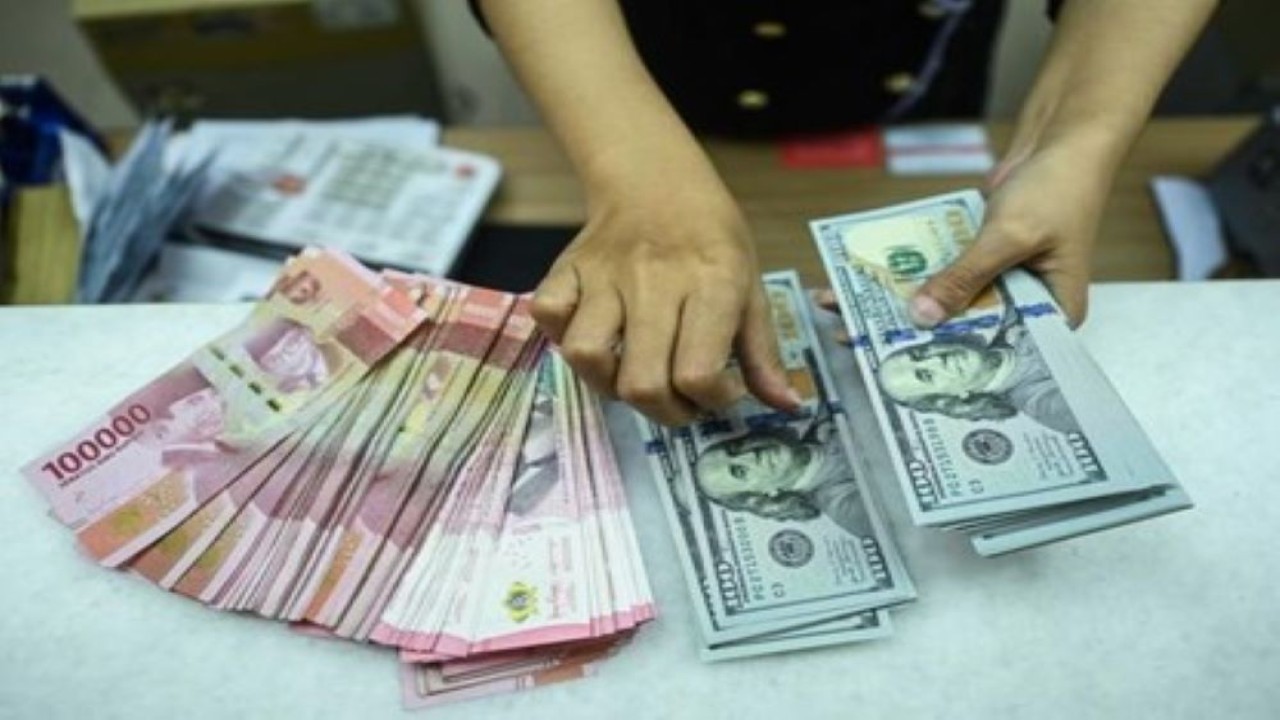 Mata uang Rupiah dan Dolar AS/ist