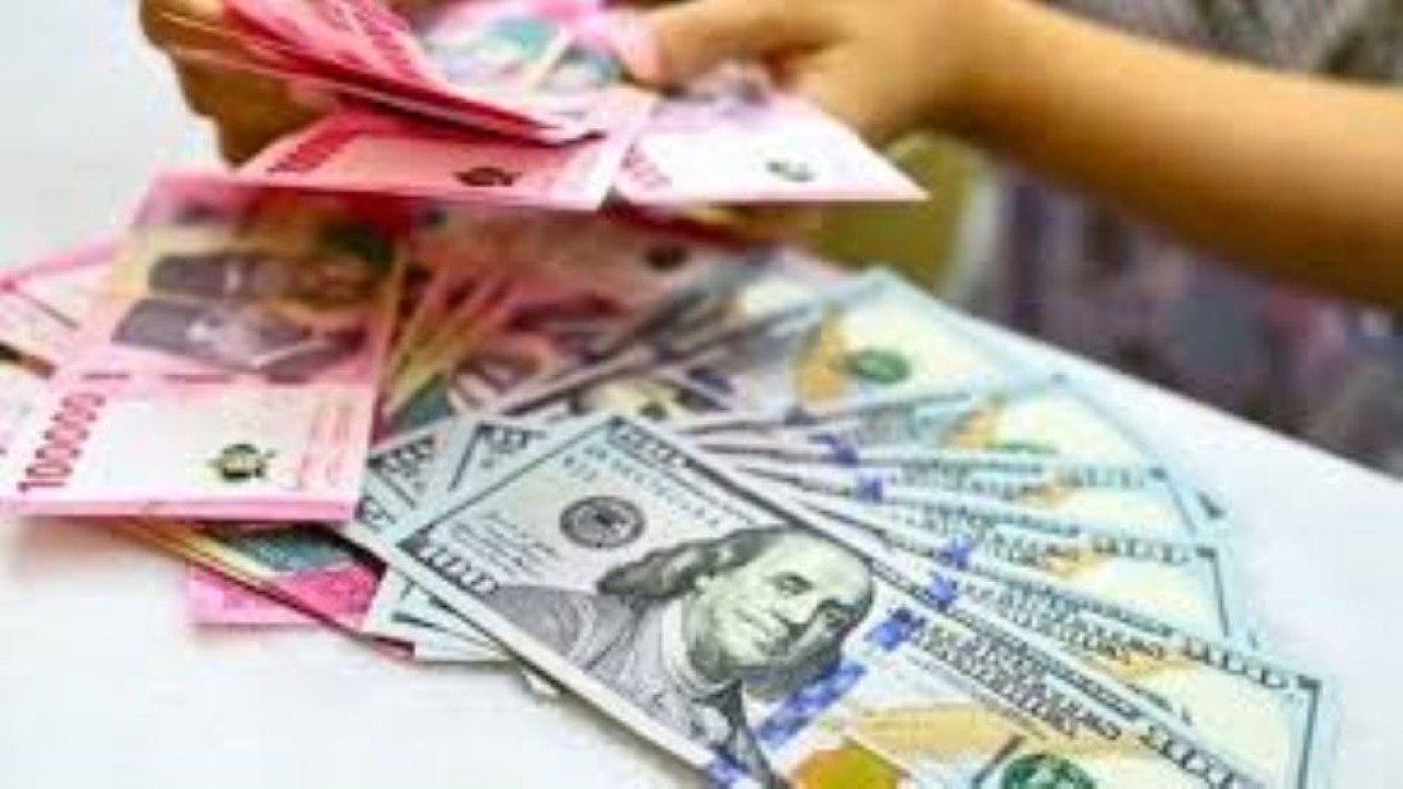 Mata uang Rupiah dan Dolar AS/ist