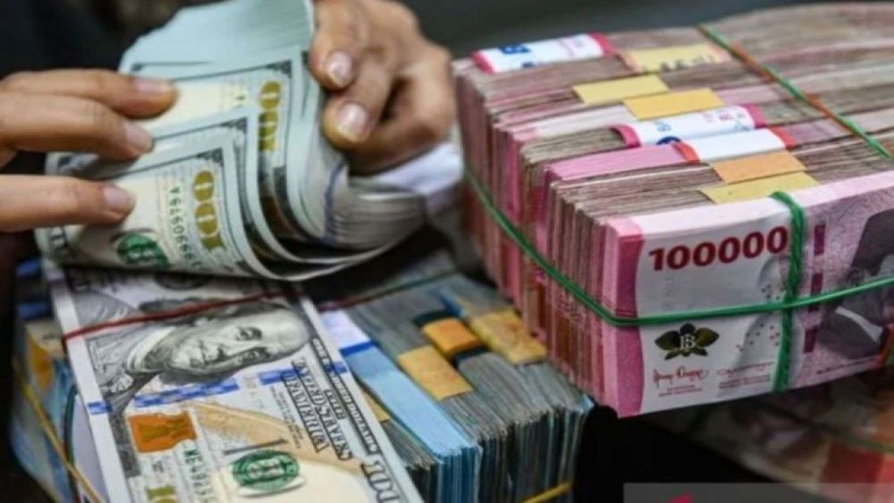 Mata uang Rupiah dan Dolar AS/ist