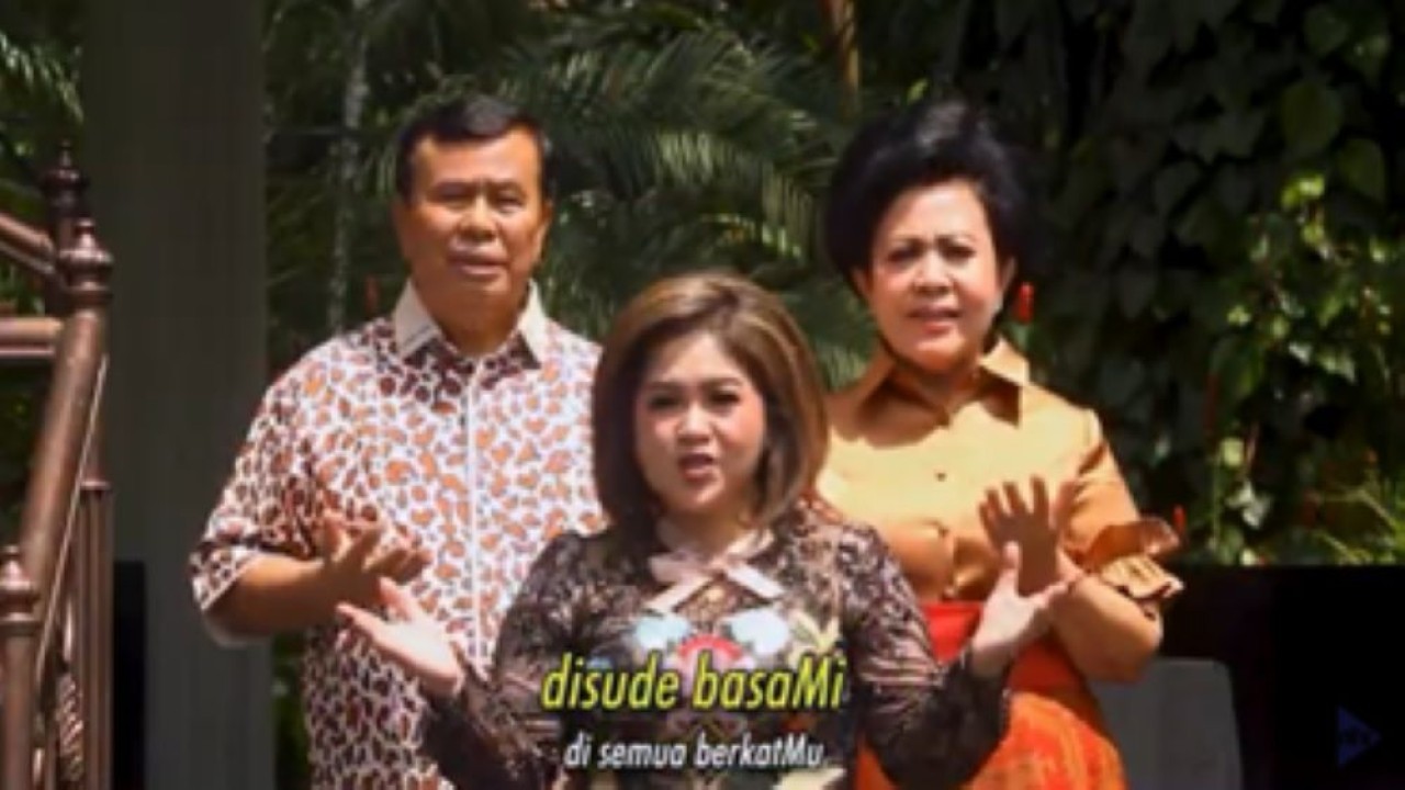 Dr Ir Nurdin Tampubolon MM dan istri Lince Berliana Tobing bersama Joy Tobing